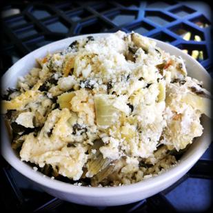 In a medium bowl, mix together Greek yogurt, cottage cheese, Parmesan cheese, mozzarella cheese, minced garlic, salt and pepper. Gently stir in artichoke hearts and spinach.