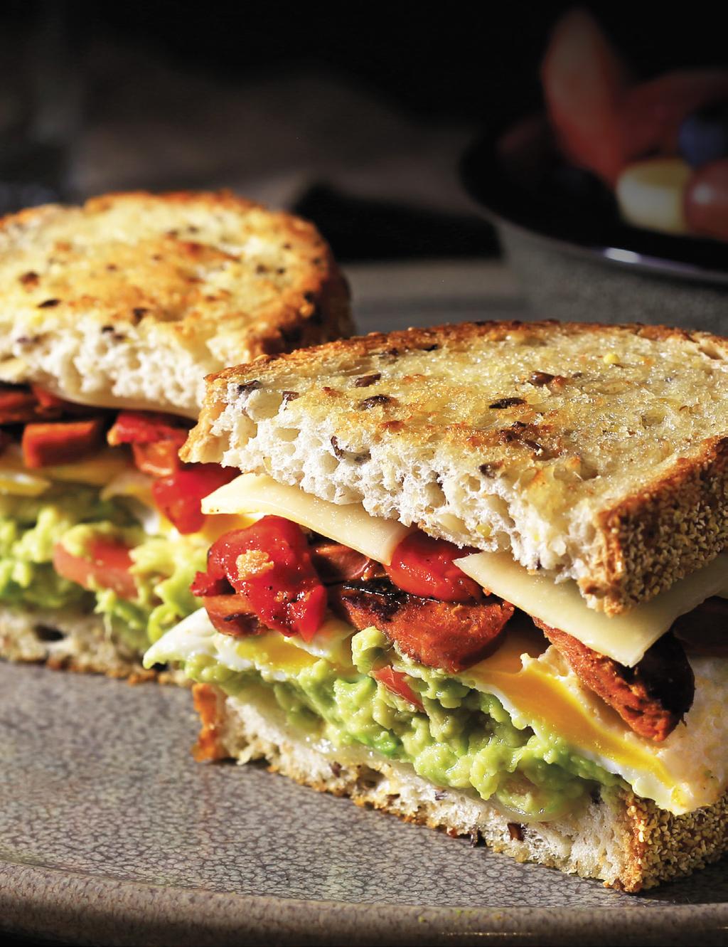 NEW ITEM BREAKFAST MELT Egg, chorizo, guacamole, roasted red peppers and Swiss cheese on