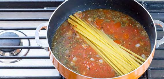 2 Add crushed tomatoes, Garlic Galore Seasoning Blend, Hearty Spaghetti Sauce Blend,