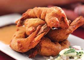 Indian Recipes PRAWNS PAKORA 600 gr of prawns 50 gr of chickpea flour 1 large red onion finely sliced 1 small tablespoon of grenade dry seeds 4 green chilies without seeds finely chopped 2 small