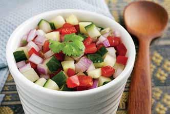 KACHUMBAR 1 big red onion finely sliced 2 small cucumbers finely sliced 100 gr of ripe tomatoes finley sliced 3 small tablespoons of fresh coriander finely sliced Fresh coriander leaves 1 green chili