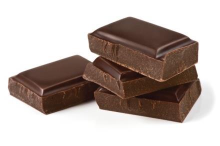 Chocolate History Evidence shows chocolate has been produced as early as 1900 B.C. Consumed originally as fermented, roasted and then ground cacao beans into a paste that they mixed with water, vanilla, honey, chili peppers and other spices to brew a frothy chocolate drink.