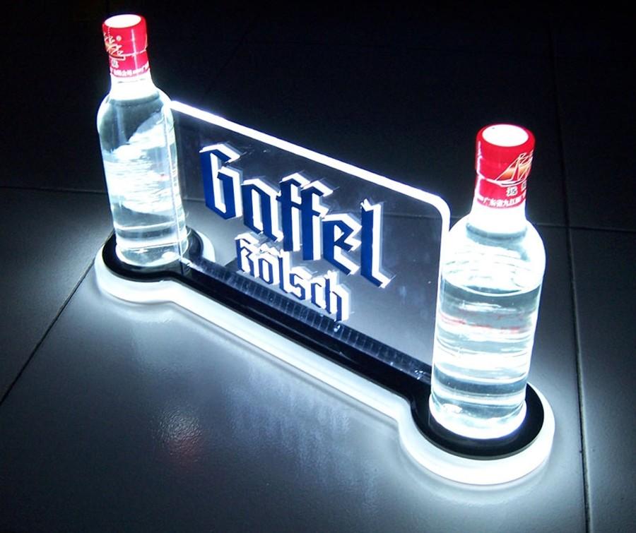 Bottle Glorifier - 2 Bottle Let your favorite beverages shine with our illuminated LED beverage glorifier. Holds 2 liquor bottles. Includes UL adaptor.