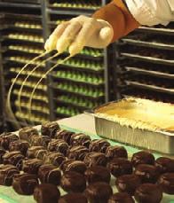 Each decadent Grand Truffle center is twice-dipped in chocolate, then