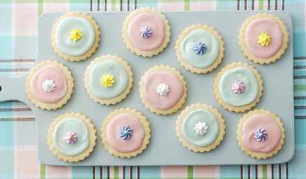 Gorgeous Iced Biscuits 100g/3½oz butter 100g/3½oz caster sugar 1 egg 275g/10oz plain flour 1 teaspoon vanilla extract To decorate: 400g/14oz icing sugar, 3-4 tablespoons water and different food