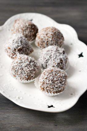 Coconut Date Balls MAKES 12 BALLS CALORIES PER BALL: 34 12 pitted dates, chopped 3 tbsp hot water 6 tbsp desiccated coconut 1. Place dates in a small shallow dish and pour over the hot water. 2.