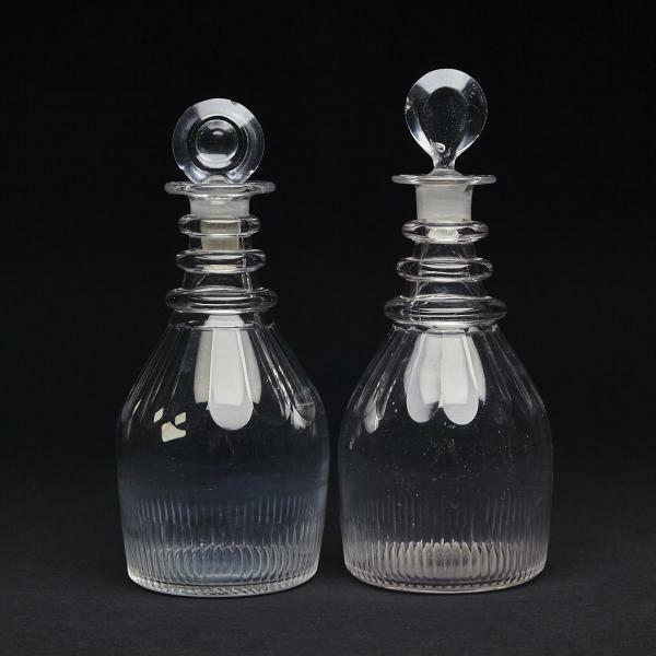 Estimate: $150 250 36 PAIR OF ENGLISH CUT GLASS DECANTERS, LATE 19TH with stoppers, minor chips, height 13" 33 cm. 37 PAIR OF ENGLISH CUT GLASS DECANTERS, C.1865 with stoppers, minor chips, height 11.
