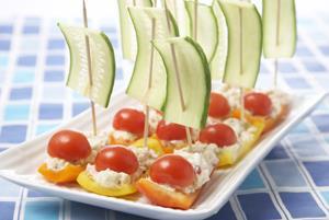 BABY MOSES TUNA BOATS For Tuna Salad: For the Boats: 6-7 ounces water packed tuna, drained 3 bell peppers (any color) ¼ cup diced celery 6-7 cherry tomatoes, halved ½ teaspoon lemon juice 1 cucumber