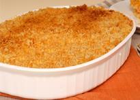 MATZARONI AND CHEESE 3 large eggs 1 teaspoon salt 3 ½ cups matzo farfel or 6 matzo pieces crumbled ¼ teaspoon pepper ½ lb cheddar cheese and extra shredded to 1 pint sour cream sprinkle on top 1