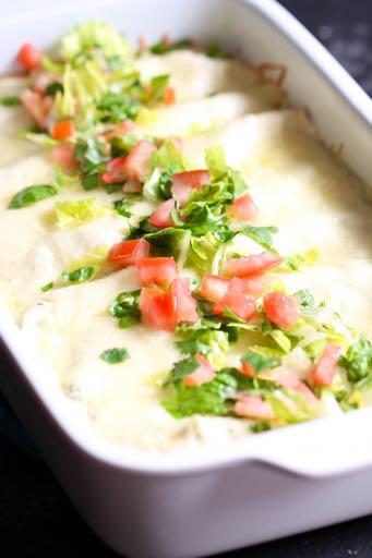 DAY 7 SALSA VERDE ENCHILADAS M A I N D I S H Serves: 6-8 Prep Time: 15 Minutes Cook Time: 20 Minutes 1 (16 ounce) bottle salsa verde (divided) 1 cup sour cream 1/2 cup chopped cilantro (divided) 3
