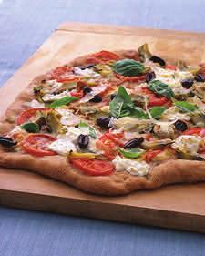 Whole-Wheat Pizza with Artichokes and Pecorino Ingredients 4 steamed artichokes 1 tablespoon fresh lemon juice 1 tablespoon olive oil, plus more for baking sheet 1 pound whole-wheat pizza dough 1 cup