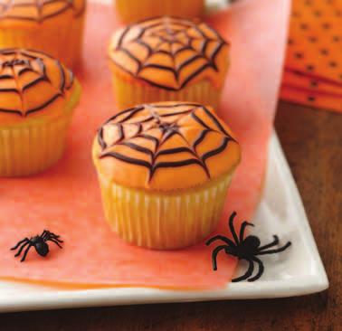 Halloween Cupcakes Dip cupcakes in melted