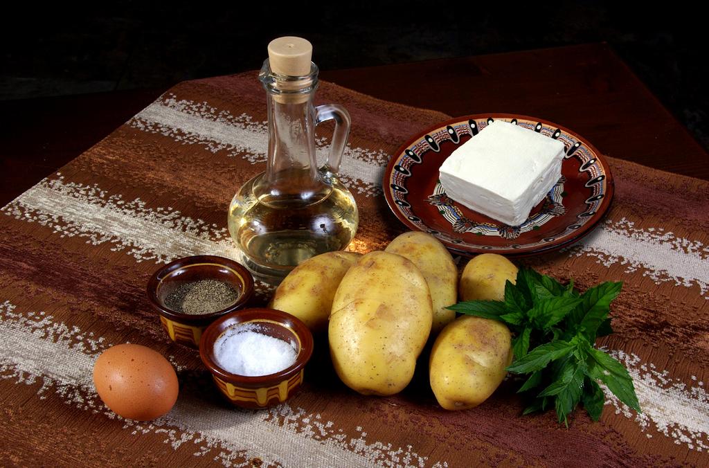 TRADITIONAL BULGARIAN CUISINE RECIPE PATATNIK needed products The classic recipe for the Rhodope Patatnik includes 10 medium-sized potatoes (about 1 kg), 1 egg,