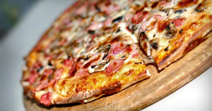 Homemade Pizza Serves: 6 Serving Size: 1 slice 1 pound ready-made pizza dough (regular or whole wheat) 1 cup pizza sauce or spaghetti sauce 1 cup part-skim mozzarella cheese*, shredded 2 cups steamed