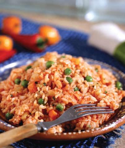 Mexican Rice 1 tablespoon vegetable oil 1 cup chopped onion 1 (14½-ounce) can low-sodium chicken broth 1 cup white rice ¾ cup chopped tomatoes ½ teaspoon chili powder ¼ teaspoon salt 1 cup frozen