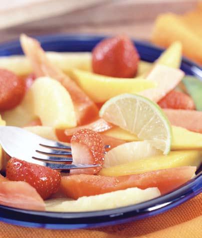 Tropical Fruit Platter 1 (20-ounce) can pineapple slices, each cut in half 1 large papaya wedge, peeled and sliced 1 mango, peeled and sliced 2 cups strawberries, stemmed juice of 1 lime 1.