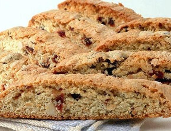 Biscotti 1 1/4 cup flour 1 tsp baking powder 1/2 cup sugar 1 tsp cinnamon 1/2 cup vegan chocolate chip 1/2 cup toasted shaved almonds 3 tsp Silk milk Add ingredients together one at a time and mix