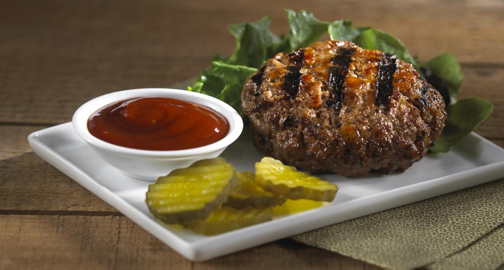 1/2 cup Keebler Zesta Original crackers 1/3 cup barbecue sauce 2 tablespoons sliced green onion 1/4 teaspoon pepper 1 pound lean ground beef 8 dill pickle slices Barbecued Stuffed Patties Prep Time: