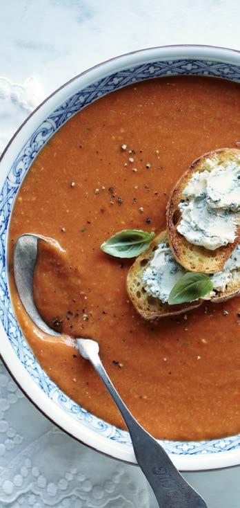 ROASTED TOMATO SOUP WITH BLUE CHEESE CROUTONS MAKES 4 SERVINGS PREHEAT OVEN TO 400 F Arrange tomatoes, onion and garlic in baking pan; drizzle with teaspoon olive oil. Roast 25-30 minutes.