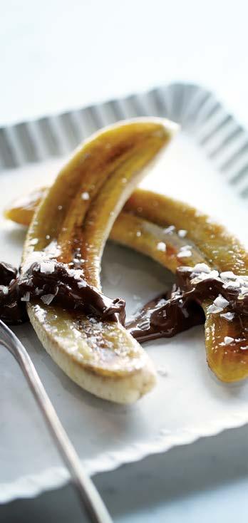 CARAMELIZED BANANA WITH SALTY CHOCOLATE-HAZELNUT CREAM MAKES 4 SERVINGS PREHEAT BROILER For chocolate-hazelnut cream, place peanuts in KitchenAid Diamond Blender and pulse on Speed 2 (Chop) 2 to 3