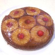 Pineapple Upside Down 50g soft margarine 50g caster sugar 50g self raising flour 15ml syrup 1 pineapple ring 1 glace cherry Scales Spoon Knife Spatula Baking tray Cake tin Plate 1.