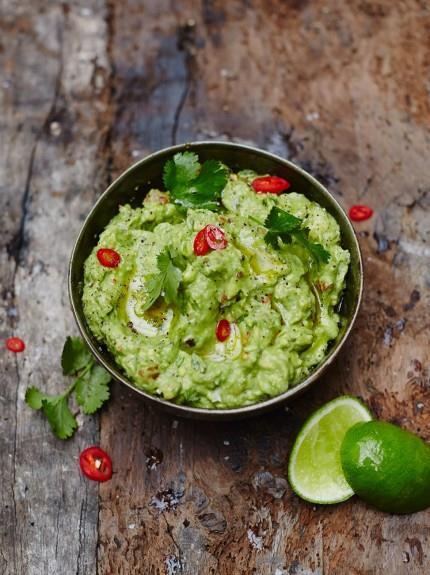 Classic guacamole ½ a small red onion 1-2 fresh red chillies (Optional) 3 ripe avocados 1 bunch of fresh coriander 6 ripe cherry tomatoes 2 limes extra virgin olive oil 1. Peel the onion and 2.