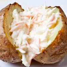 Lesson 7 : Baked Potato/coleslaw/cheese and sour cream Work in Pairs 2 potatoes Knife ¼ Carrot Microwave 1/8 of a cabbage Baking Tray 30 g ( 2Tablespoons ) Tasty cheese Bowl 1 Tablespoon Coleslaw
