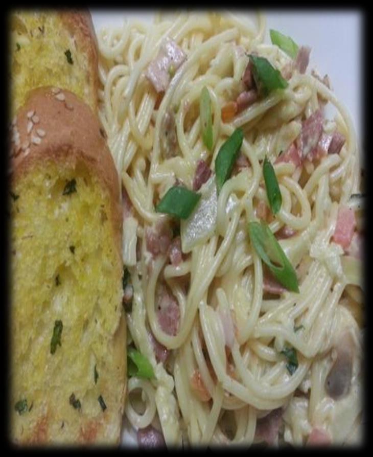 Spaghetti Carbonara Ingredients 125g smoked bacon diced 1 garlic clove, finely chopped 1 tbsp olive oil 300-350g dried spaghetti 2 very large eggs (or 3 small) 140ml single cream 5 tbsp parmesan