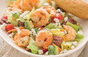 Seared Shrimp Romaine Salad 1 tablespoon vegetable oil 1½ pounds (26-30 count) raw shrimp, peeled and deveined ½ cup Vidalia Onion Dressing, divided 18 ounces chopped Romaine lettuce ½ cup shredded