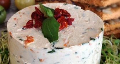 Raw, Dairy-Free Cheeses Raw Sun-dried Tomato and Basil Cheese Spread - $11 for 150 g Cultured cheese with a lovely smooth texture.