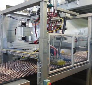 Capper and Creamer (SMA) The Capper and Creamer assembly is designed to sandwich products directly on the oven conveyor.