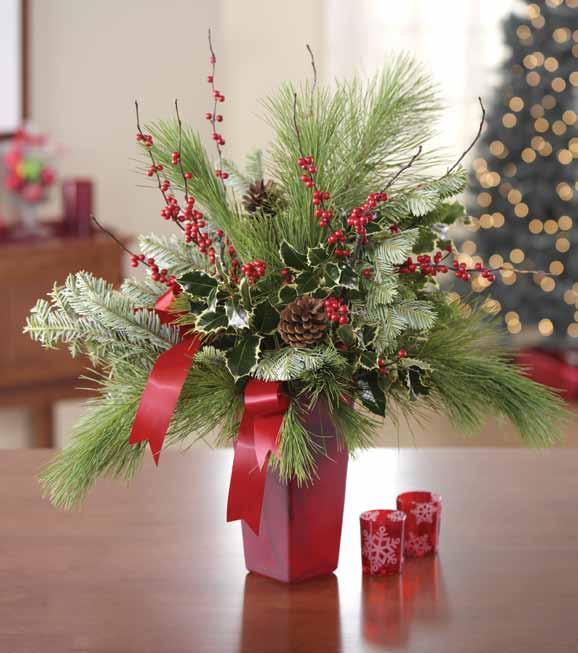 D. D. Holiday Greetings Convey the spirit of the season with this superbly crafted assortment of red roses, white lilies, burgundy