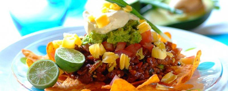 Mexican-Style Nachos with Ostrich Mince Tuesday 21st August COOK TIME PREP TIME SERVES 00:40:00 00:05:00 4 Ostrich mince makes a healthy and tasty sauce for these delicious nachos served with spring