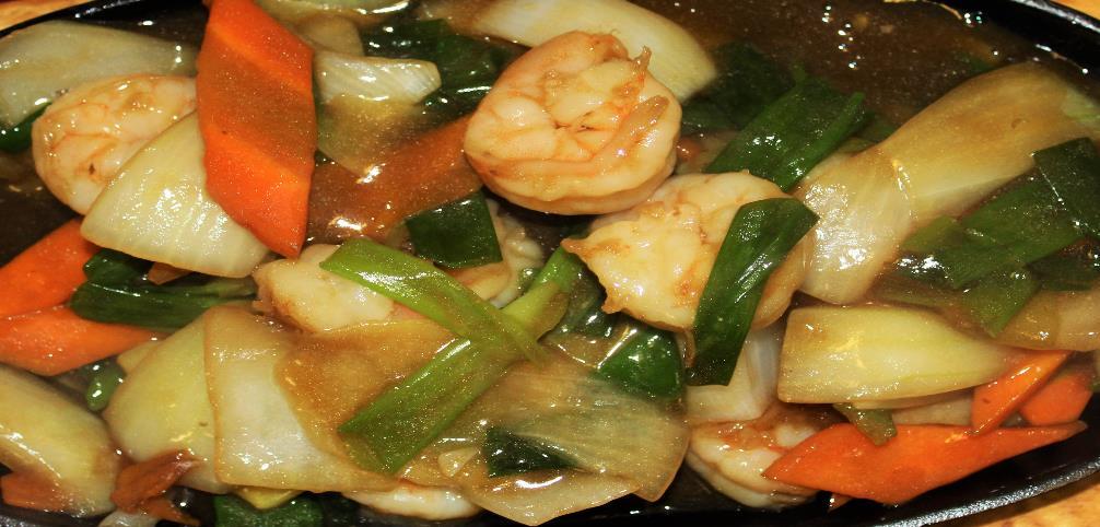 Ginger and Spring Onion Dishes A Deliciously simple dish made with two traditional ingredients of Ginger and Onion, stir fried with your choice of Meat or Seafood.