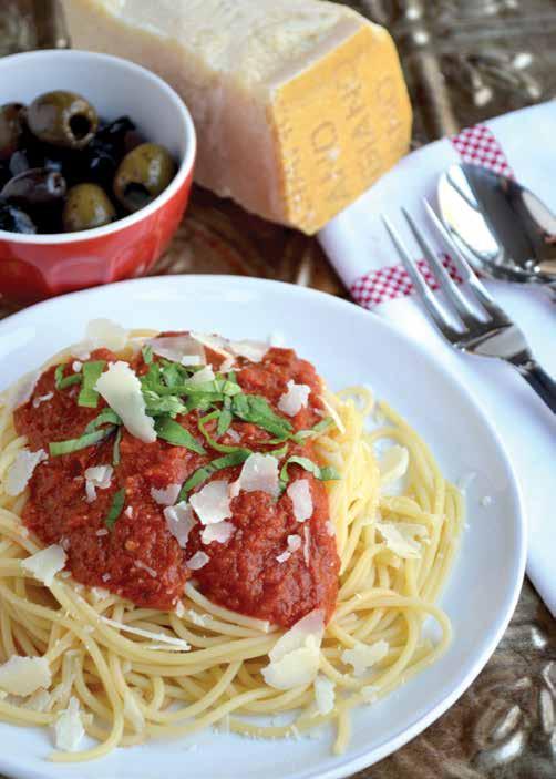 Marinara Sauce 3 tablespoons olive oil 3 cloves garlic, finely chopped pinch crushed red pepper flakes 2 (28 ounce) cans crushed tomatoes 1 teaspoon salt freshly ground black pepper ½ teaspoon sugar