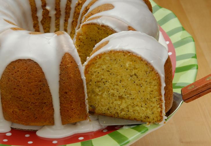 Scrape down sides of bowl and combine with a spoon and pour batter in prepared cake pan.