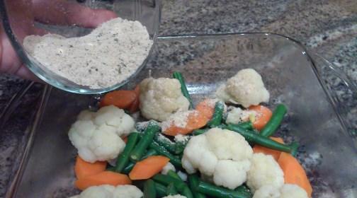 Add the vegetables to an 8x12 baking dish. Spread them out evenly.