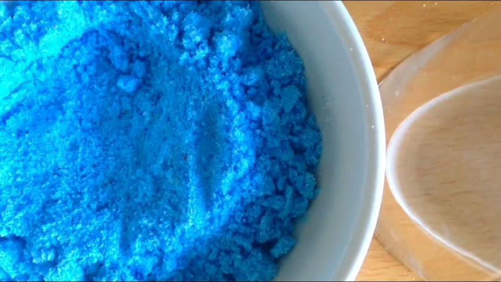 In your second medium bowl, add 5 to 10 drops of blue food coloring while using