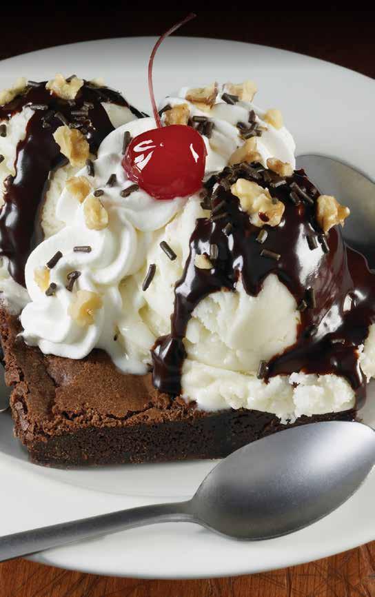 BROWNIE 135 Häagen-Dazs Vanilla ice cream and hot fudge on a fresh brownie, topped with chopped walnuts, chocolate sprinkles, fresh whipped cream and a cherry.