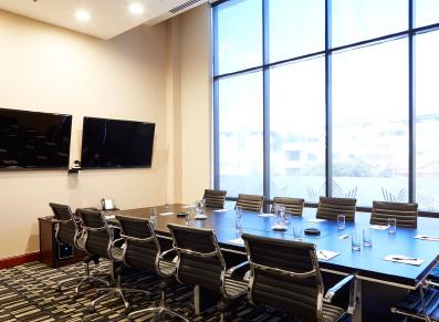 delegates, equipped with tele-conference facilities, connectivity for laptops and two TV screens.