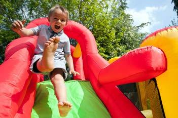Outdoor fun such as interactive inflatables, yard games, and traditional picnic-style activities mix well