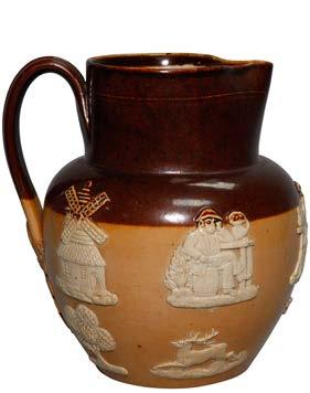 5 H (D4397) $150 A gold rim adorns this beautiful Royal Doulton pitcher with three Greek panels featuring