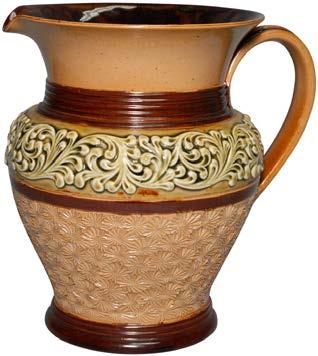 This delightful Doulton Lambeth stoneware pitcher, decorated with
