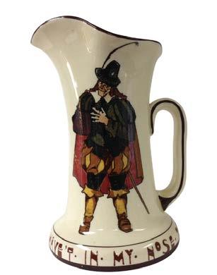 stoneware pitcher is decorated with Shakespeare s portrait and his