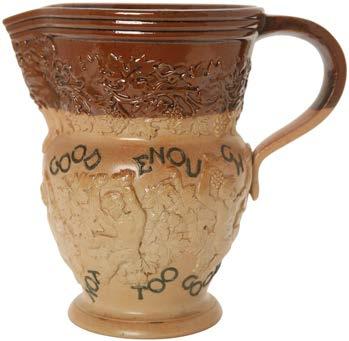 Doulton pitcher with a relief pattern around the top and bottom.