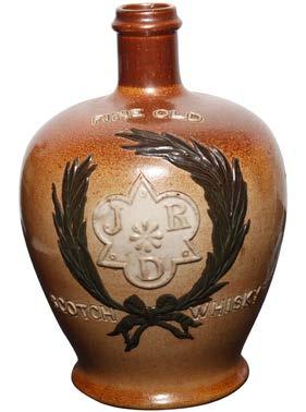 5 H $725 The motto We Fear No Foe is emblazoned on this Royal Doulton stoneware bottle for the Dundee Scottish distiller merchant.