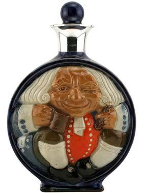 5 H $1,750 This rare Royal Doulton stoneware bottle was once filled with Choice Old Scotch Whisky from Loffet and Co.