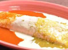 chicken, then topped with cheese sauce, enchilada sauce, lettuce and sour cream.