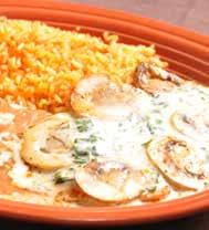 Served with rice or beans, flour tortillas and grilled vegetables 8.29 Pollo Loco Grilled chicken breast topped with onions and cheese sauce.