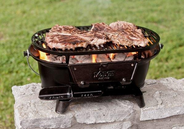 L410 - Logic Sportsman's Grill - $925.00 TTD Perfect for picnics and tailgating, draft door regulates heat and coals are accessible behind a flip-down door.